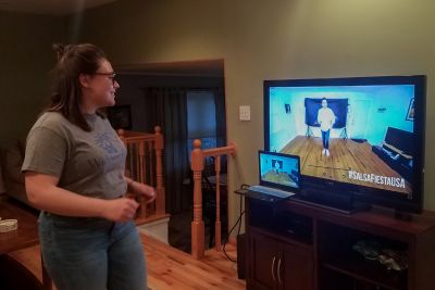 Student takes part in virtual salsa dance class at home