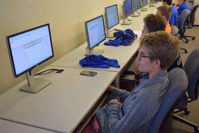 High School Students Participating in Engineering Summer Camp Activities