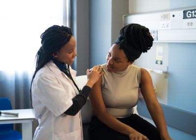 physician assistant with patient