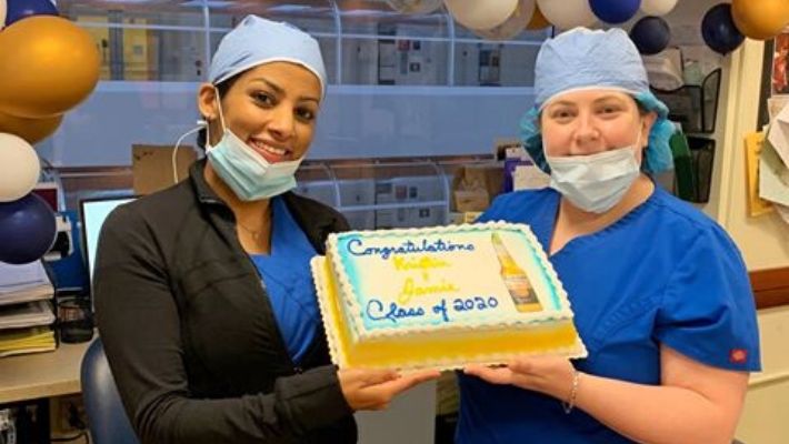 Nursing Graduate Students with cake