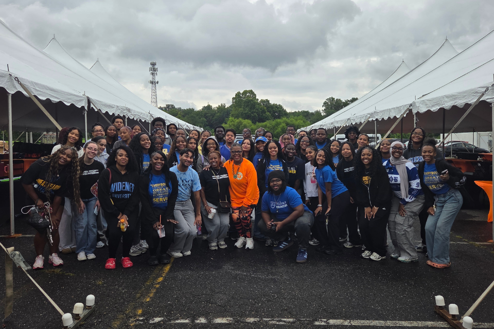 Widener student volunteers pose for a group photo at the back-to-school volunteer drive