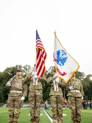 Widener ROTC Students Holding Flags