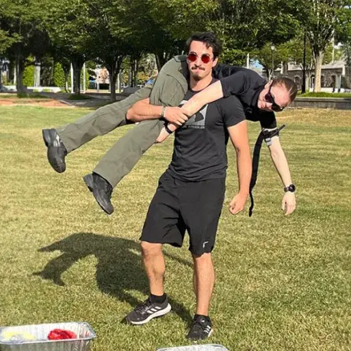 Nursing student Samuel Flood does a fireman carry during an on-campus emergency response workshop.