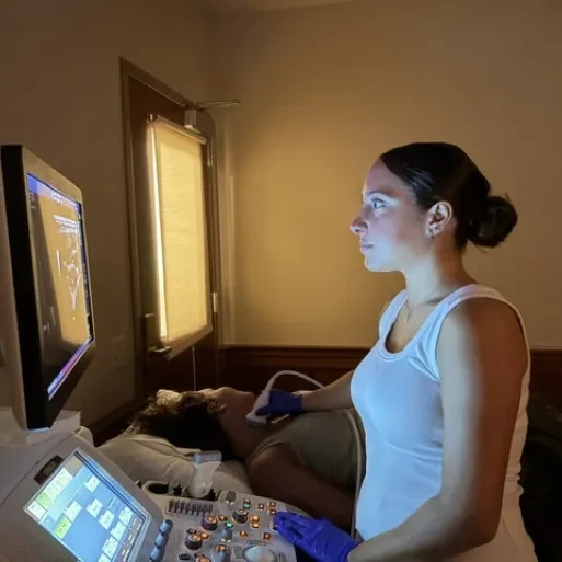 Student at an ultrasound machine