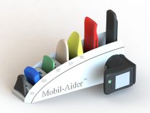 Professor Gulick's invention, the Mobil-Aider, in its docking station