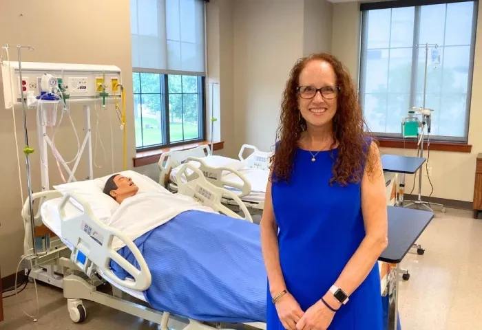 Audrey Snyder nursing sim lab 960 x 640 Dean Audrey Snyder poses in a nursing simulation lab.