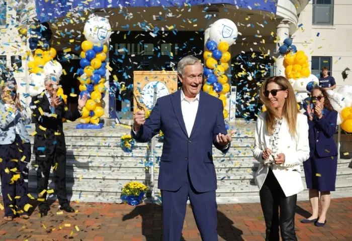 Dwyer School of Nursing ribbon cutting 960 x 640 Jack and Nancy Dwyer smile as they cut the ribbon and confetti flies to unveil the Jack & Nancy Dwyer School of Nursing.