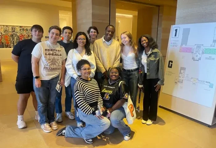 honors program students 960x640 10 students huddled together in a museum smiling for the camera