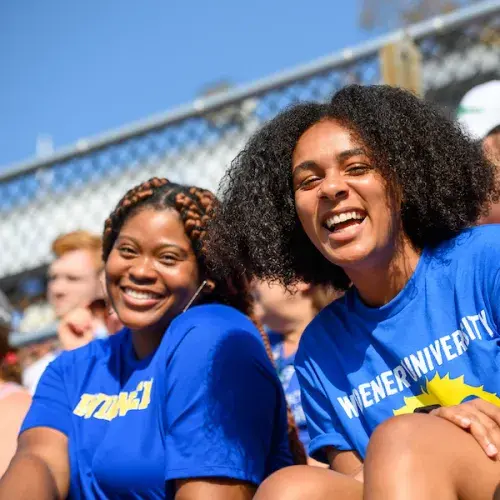 Students smiling at homecoming