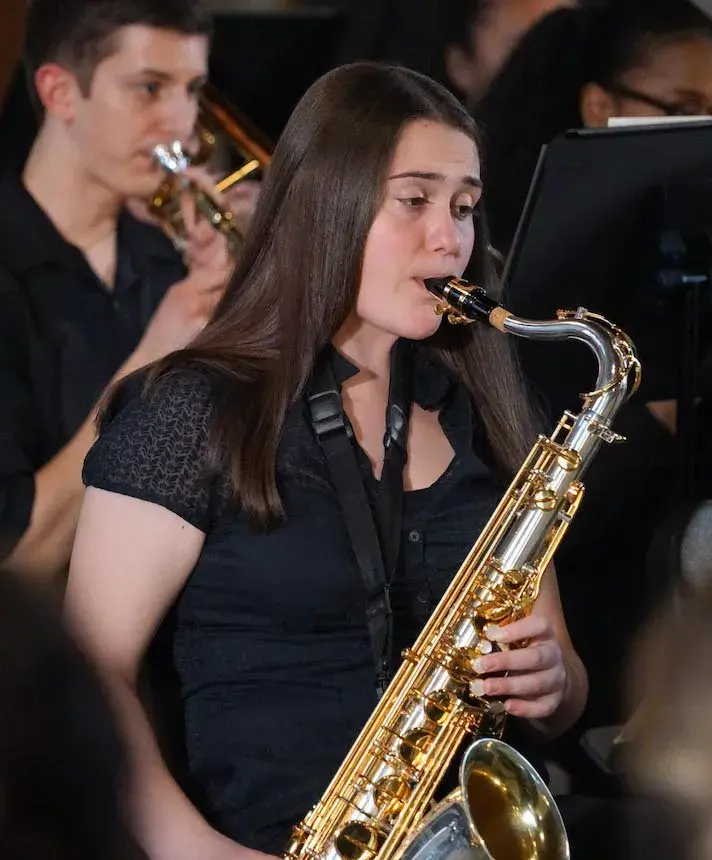 Widener Band Member Playing Brass Instrument