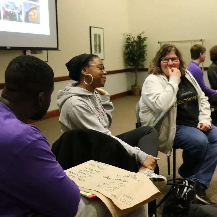 Students engage in discussion at New Hampshire Primary Watch Party