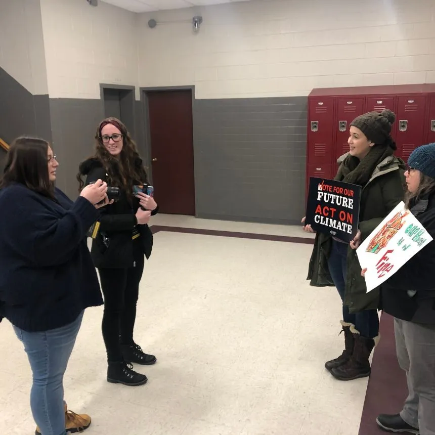 Students interview political supporters