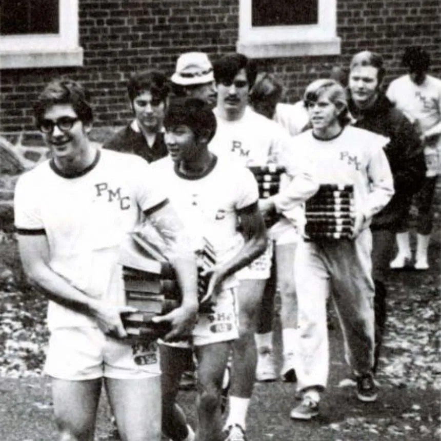 Members of the cross country team assisted in the 1970 "book walk."