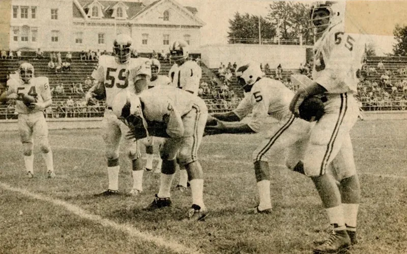 Black and white photo of Philadelphia Eagles during training camp on Memorial Field