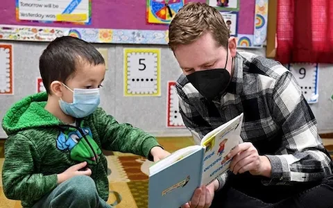 Student with child at CDC