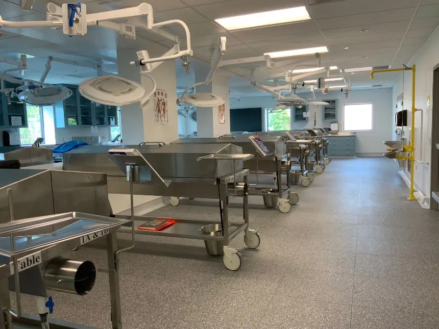 Exam tables line the new clinical anatomy lab in ACN.