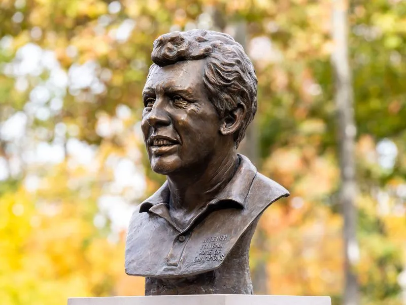 Bust statue of former football coach Bill Manlove.