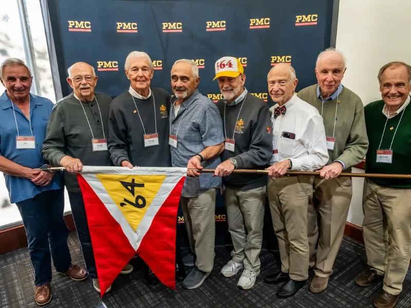 Members of the class of 1964 pose.