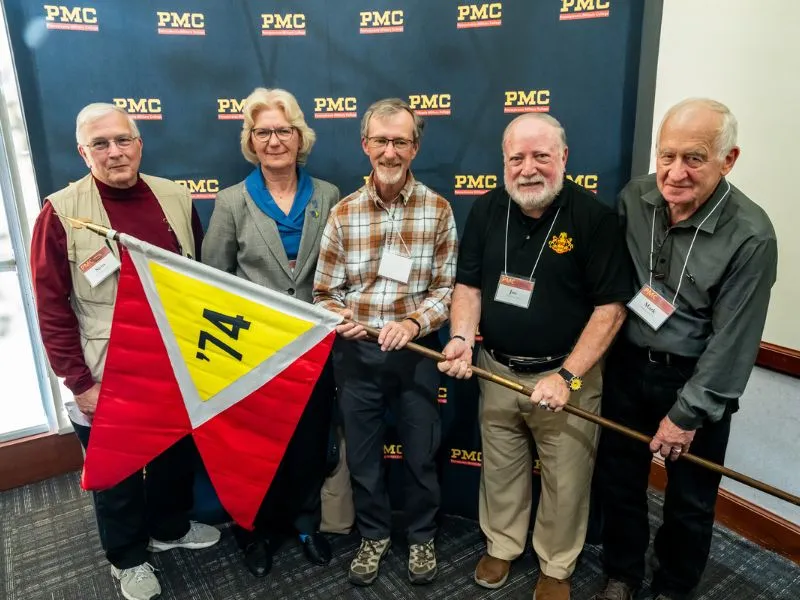 Members of the class of 1974 pose.