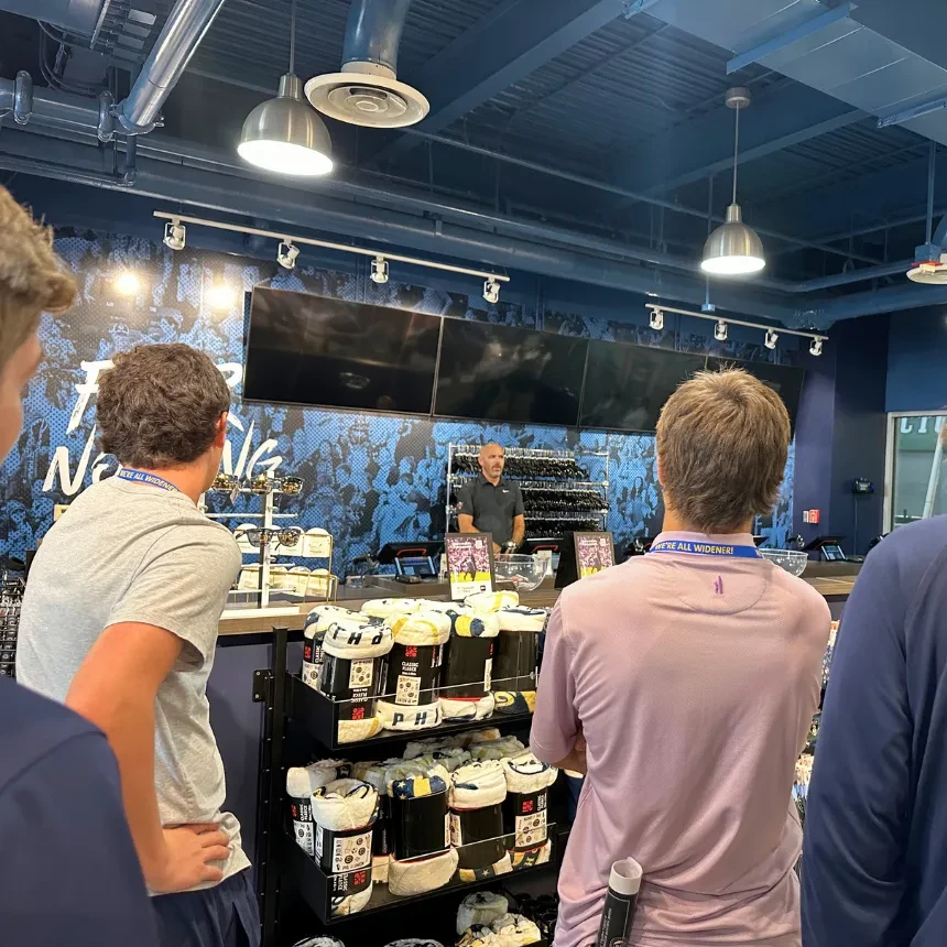 Students go behind the scenes at the Union fan shop