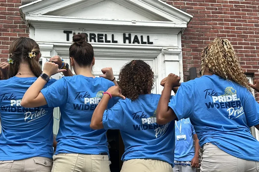 C.R.E.W. Leaders pose for a photo showing their Pride at move in