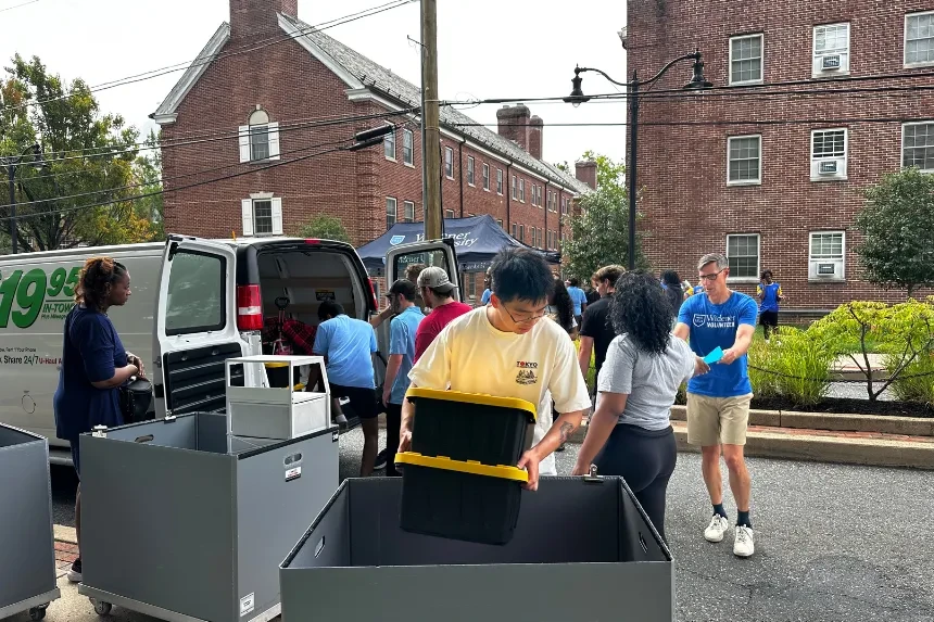 Vehicles are unloaded at move in