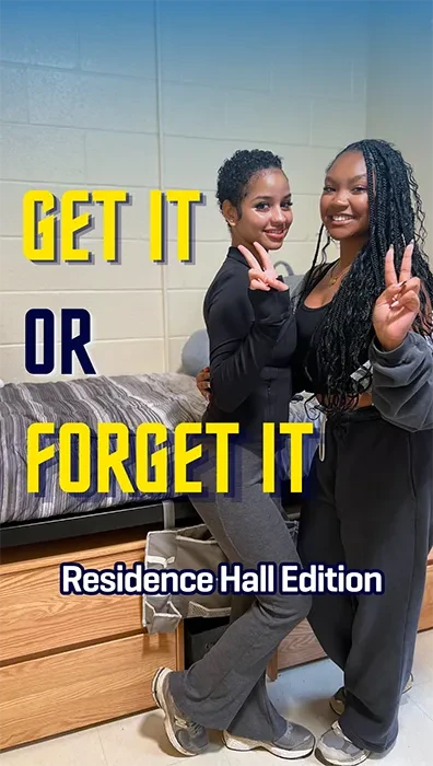 Two students stand in a residence hall giving peace signs; on the image it reads "Get It or Forget It. Residence Hall Edition"
