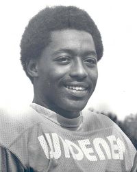 Black and white photo of football player Billy "White Shoes" Johnson wearing a Widener jersey 