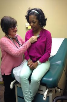 Ellen Boyda, director of the Widener Nursing Community Clinic, cares for patients in the community