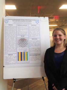 Angela Herb pictured in front of her poster at the 2017 Summer Research Symposium