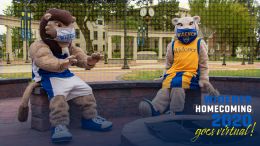 widener mascots around a firepit