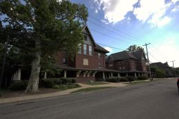 Photo shows two fraternity chapter houses located on the picturesque 13th street.
