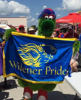 Phillie Phanatic holding Widener Pride flag