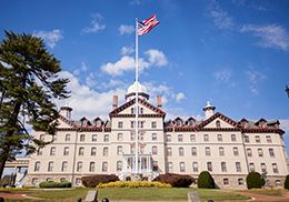 American flag in front of Old Main