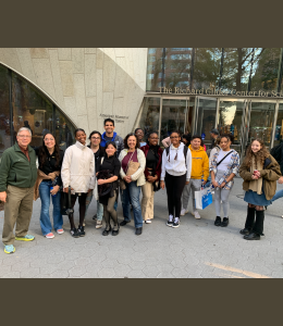 Students pose in front of the American Museum of Natural History