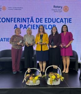 Audrey Snyder on stage receiving the award.