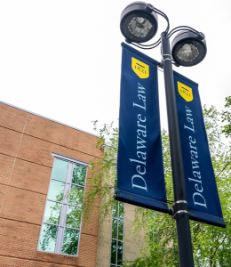 Delaware Law banners in front of main law building