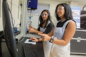 Biomedical engineering facult mentoring student in lab 300x200 School of Engineering Biomedical engineering faculty mentor engineering major in lab. Widener's School of Engineering is considered one of the top schools for engineering; offering degrees across many engineering fields.