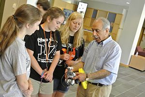 summer camp students with faculty
