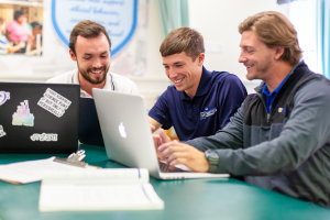 Physical therapy students on laptops