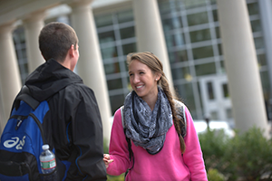 Students talking on campus 300x200 Students talking on campus