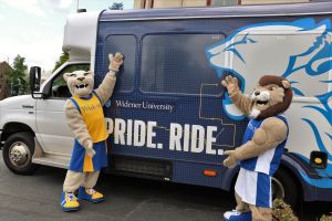 Chester and Melrose alongside the Pride. Ride. bus