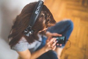 girl listening to music on phone