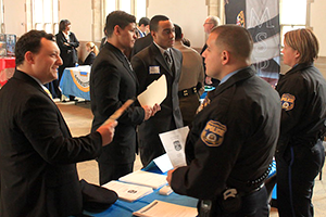 Criminal justice carer fair 300x200 Students network with law enforcement officers during Widener's criminal justice career fair.