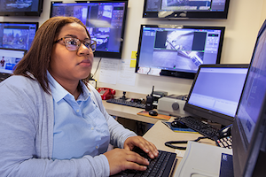criminal justice career 300x200 A woman in a criminal justice career completes her work for the day.