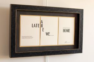 Poetry and literary works hang in framed broadsides in the Greene Poetry Room. 
