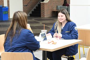 Widener nursing students eat together