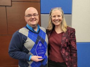 Eric Kniskern receives Wollman Award pictured with Stacey Robertson