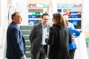 Richard Massi '97 talks with participants of the 2023 Future of Work conference.