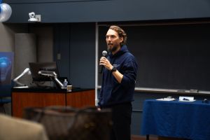 Sebastian Kreibich speaks into a microphone